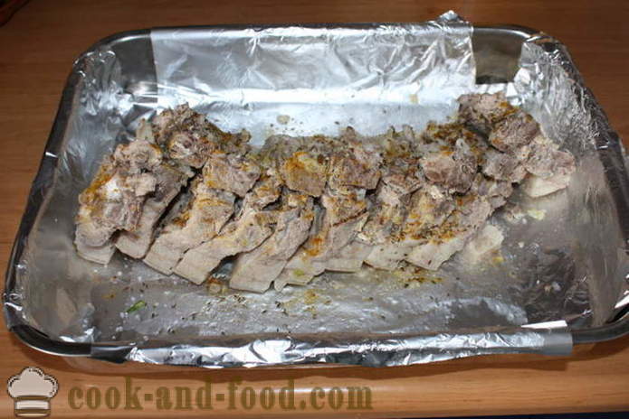 Baked pork ribs with potatoes in the oven - like baked potatoes with bacon, a step by step recipe photos