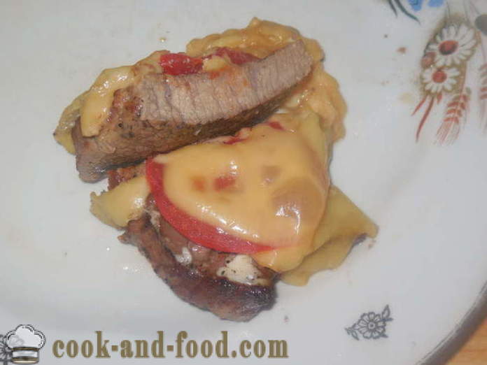 Meat with tomatoes and cheese in the oven - how to cook juicy meat in the oven, with a step by step recipe photos