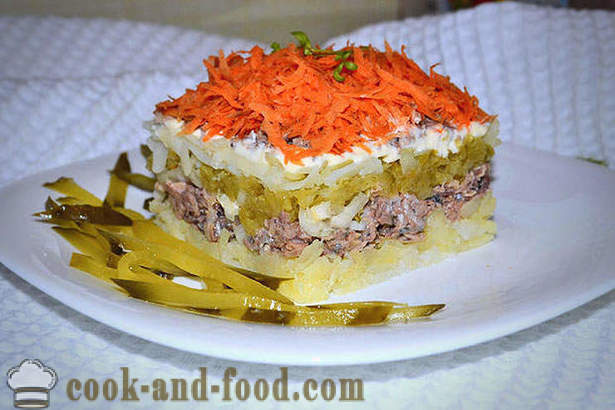 Delicious layered salad of canned fish