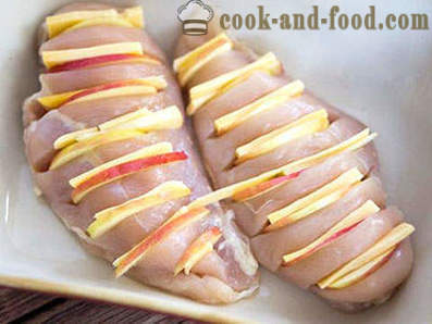 Chicken breast with cheese and an apple in the oven