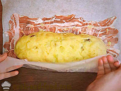 Potato cake with bacon with mushrooms and cheese in the oven