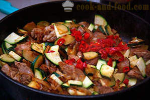 Fried pork with zucchini in the pan
