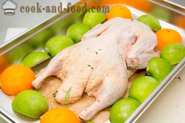 Roast duck with apples and oranges