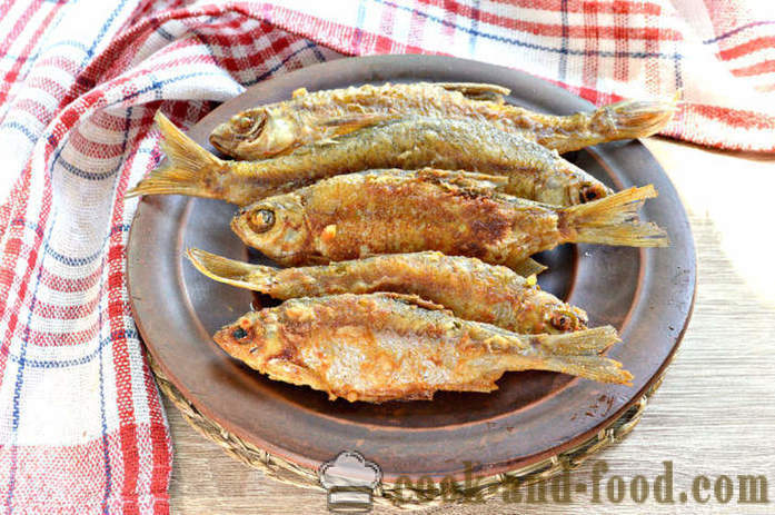 Small river fish grilled - like river fish fry in a frying pan, a step by step recipe photos