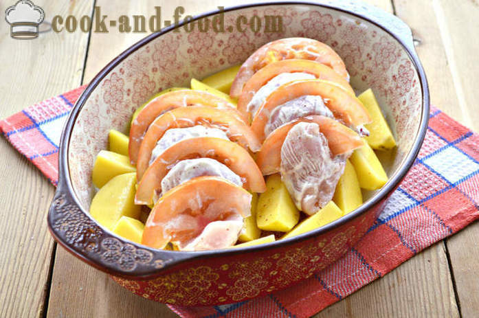 Baked potatoes with chicken and tomato - how to bake chicken in the oven with potatoes, a step by step recipe photos