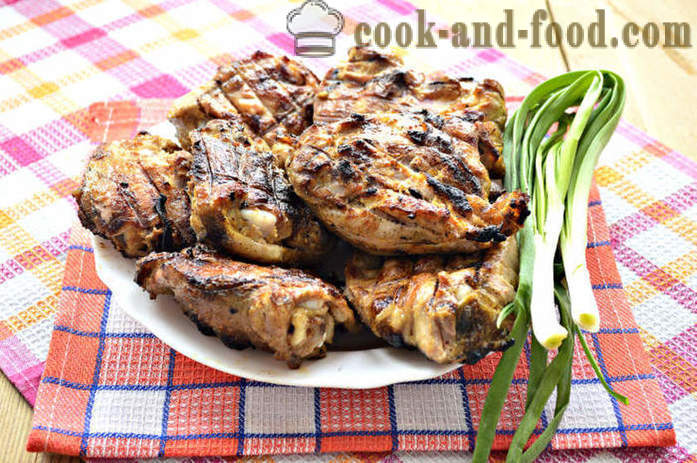 Delicious barbecue chicken thighs on the grill on charcoal - how to cook barbecue chicken on the grill on the grill, a step by step recipe photos