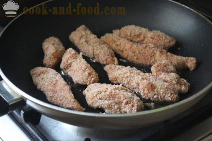 Nuggets of chicken breast breaded and fried in a pan - how to make chicken nuggets from the house, step by step recipe photos