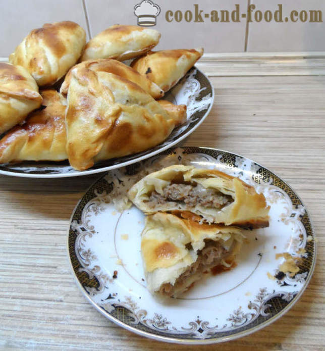 A layered Samsa with meat in the oven - samsa how to cook at home, step by step recipe photos