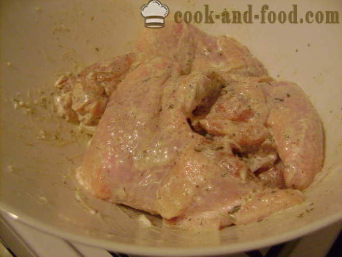 Chicken wings on a bed of potato in the oven - how to make wings and potatoes in the oven, with a step by step recipe photos