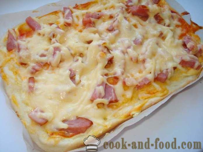 Homemade pizza with sausage and cheese in the oven - how to make pizza at home, step by step recipe photos