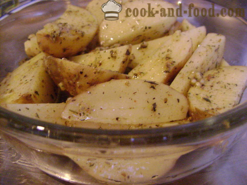 Potatoes baked with a crust - like baked potato slices in the oven, with a step by step recipe photos