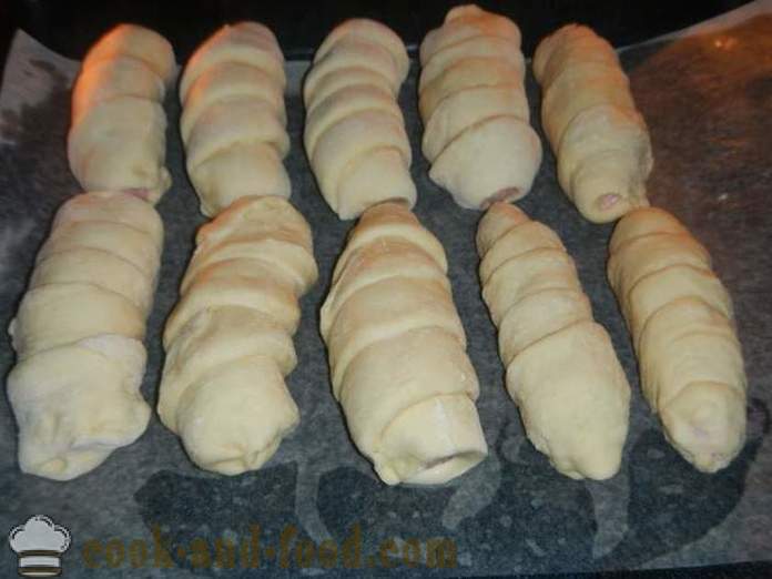 Sausages in the yeast dough in the oven - how to cook pigs in blankets at home, step by step recipe with photos.